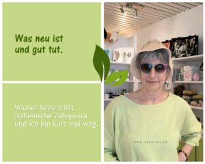 Gaby vom Coiffure naturell mit Sonnenbrille im Laden, kündigt Sommerpause an
